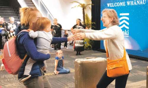 Hugs, tears as Australia-NZ travel bubble reunites families