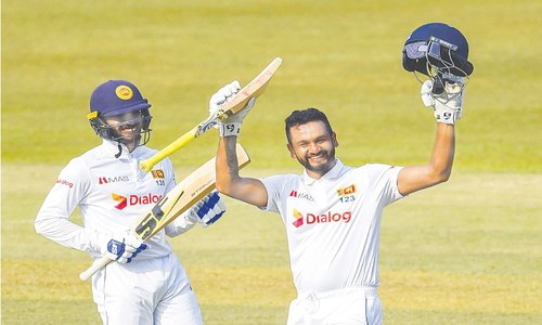 Karunaratne hits double ton as SL bat through on wicketless day