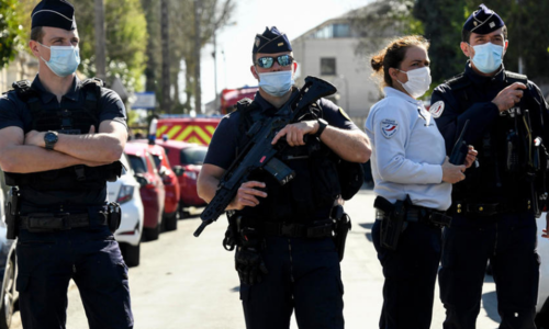 Three held after police worker stabbed to death near Paris