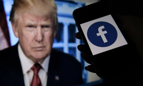 Facebook oversight board upholds Trump ban, calls for more review