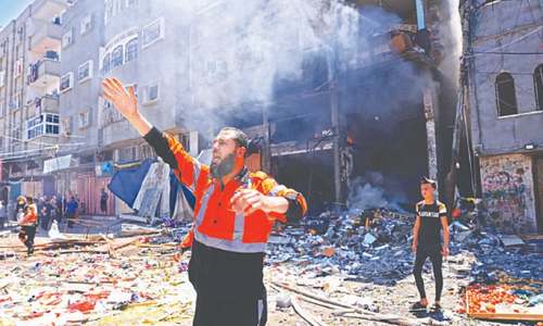 Israel pounds Gaza, flattens building housing media offices