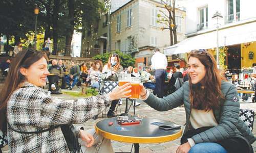 French return to cafes, museums after half-year Covid closure French return to cafes, museums after half-year Covid closure