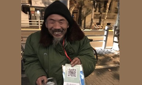 چین کے تو بھکاری بھی 'ڈیجیٹل' ہیں