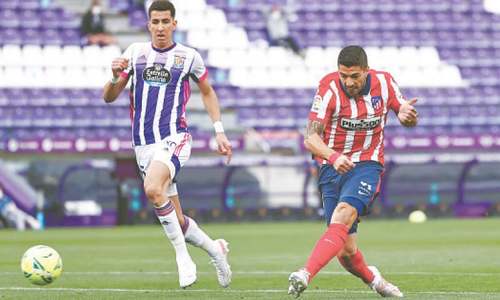Suarez, Simeone celebrate Atletico title with tears, smiles Suarez, Simeone celebrate Atletico title with tears, smiles