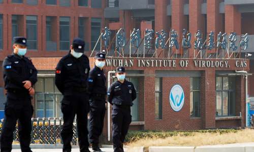 China rails at Biden move to probe virus origins