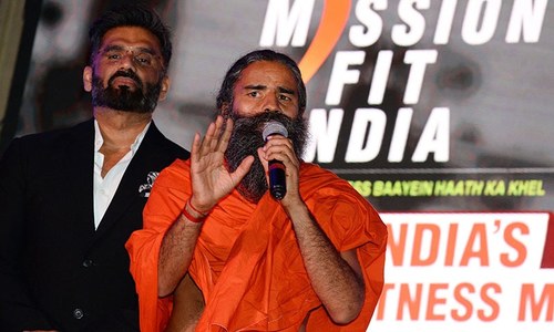 Indian doctors observe 'Black Day' to protest guru's claims that yoga prevents Covid-19 Indian doctors observe 'Black Day' to protest guru's claims that yoga prevents Covid-19