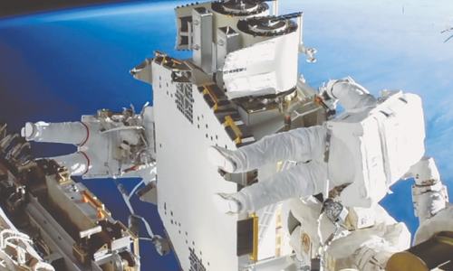 Astronauts install new solar panels on space station