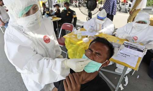 Indonesia hits 2m cases as Covid spirals out of control