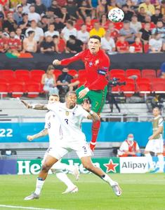 Record-equalling Ronaldo saves Portugal as Germany avoid shock exit