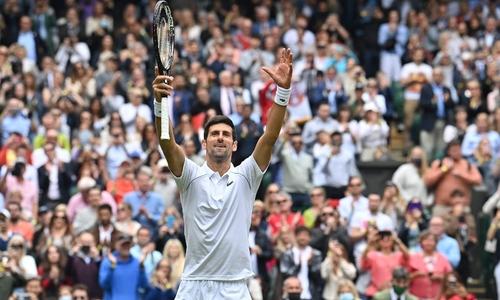 More slipping and sliding at Wimbledon as Djokovic wins