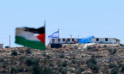 Israeli settlers leave West Bank outpost after deal with govt