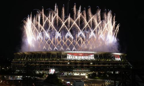 With muted ceremony and empty stadium, Tokyo Olympics begin