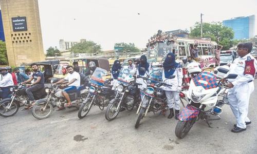 Policewomen riding heavy bikes may inspire sanity on city roads