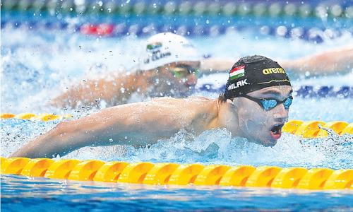 Ledecky wins gold, Biles in second pull-out
