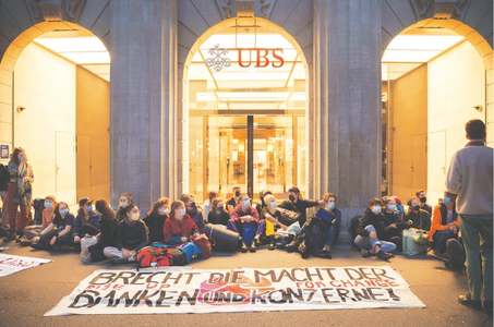 Climate activists blockade UBS, Credit Suisse HQs in Zurich