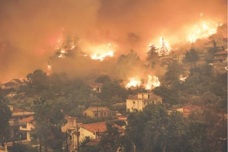 Fire devours Greek island&rsquo;s forests; residents urged to flee