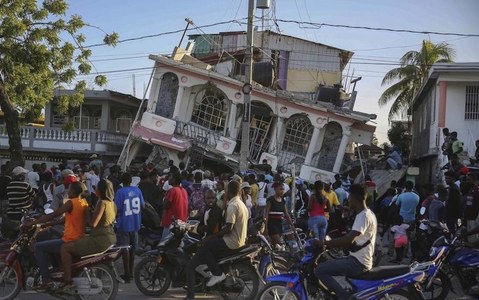 At least 304 dead, 1,800 hurt as powerful quake slams Haiti