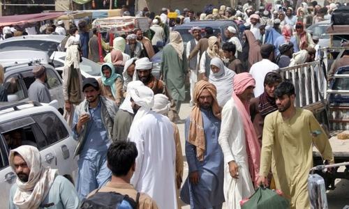 With no evacuation flights, Afghans weigh risky overland trips to borders