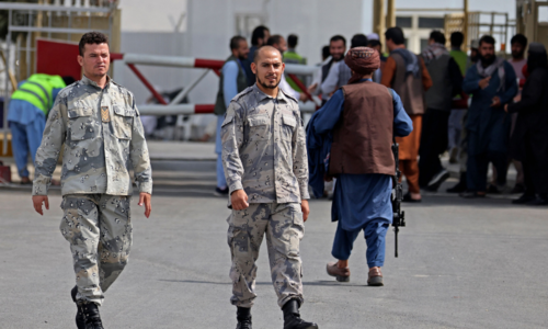 Afghan police return to work alongside Taliban at airport