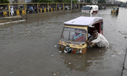 In pictures: A few hours' downpour in Karachi revives memories of last year's horror