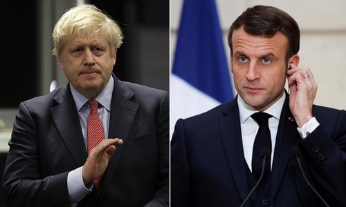 UK seeks smoother waters with France after subs row