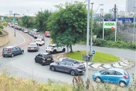 Long queues, fuel rationing as Britain faces truck driver shortage