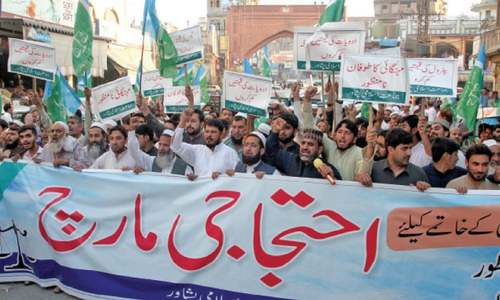 Opposition, traders demand reversal of hike in oil, power prices