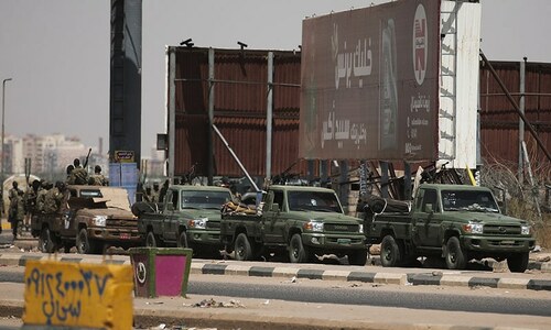Sudanese take to streets in defiance of military coup