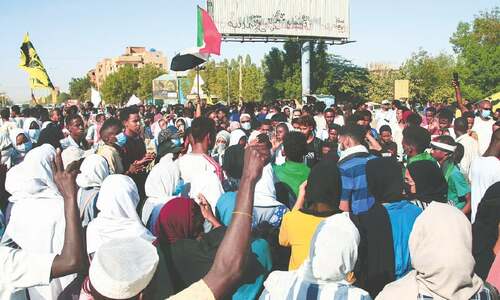 Sudan police fire tear gas as thousands protest in capital