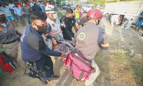 54 die after truck smuggling migrants crashes in Mexico