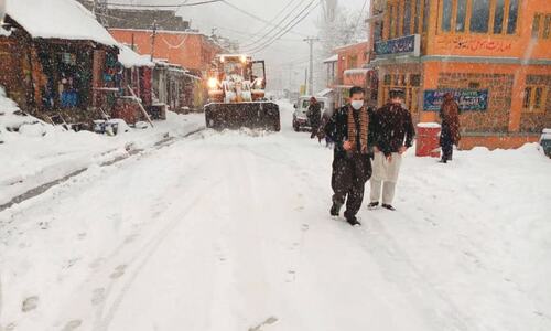 Snowfall, rain turn weather cold in parts of KP