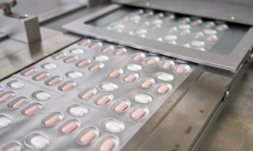 Drugmaker Pfizer says Covid-19 pill near 90pc effective