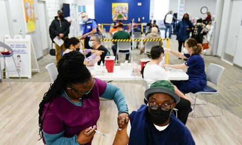 Surging Covid-19 cases bring a 2020 feel to  the end of 2021