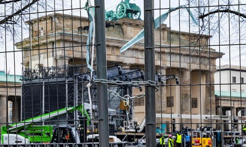 WHO warns of Omicron overload as China, Europe impose new curbs