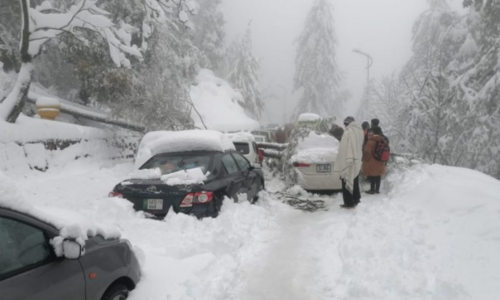 Snow clearing vehicles parked at Sunny Bank during blizzard, Murree probe learns