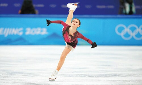 Broken Valieva falls out of medal places as team-mate wins gold