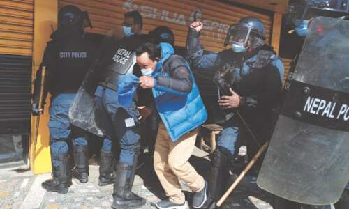 Protesters teargassed as Nepal MPs debate US grant