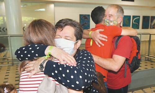 Emotional reunions as Australia opens to tourists after two-year closure