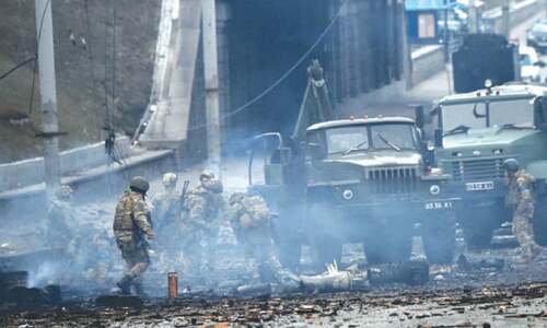 Kyiv civilians huddle in cellars as Russian forces attack the capital