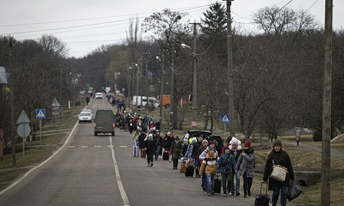 Ukrainians flee encircled cities as refugees top two million Ukrainians flee encircled cities as refugees top two million