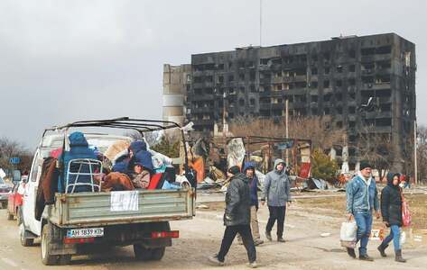 Ukrainian city of Mariupol searches for survivors after air strike hits theatre