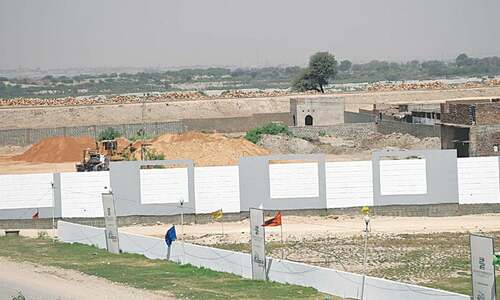 No end in sight to mushrooming of illegal housing schemes on riverbed