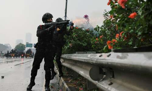 Police fire tear gas to disperse protest at Indonesian parliament