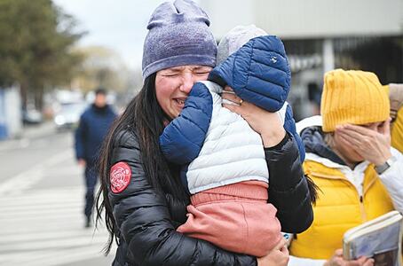 Air strikes kill seven in Ukraine as Russian forces mass in the east Air strikes kill seven in Ukraine as Russian forces mass in the east