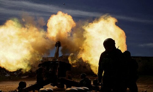 Russia steps up assault on east Ukraine, Putin threatens countries that intervene