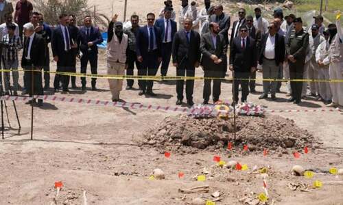 Remains of Saddam-era victims exhumed from mass grave