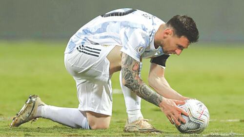 FOOTBALL: THE BALL AT THEIR FEET FOOTBALL: THE BALL AT THEIR FEET