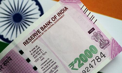Indian rupee hits record low on Fed rate hike worries