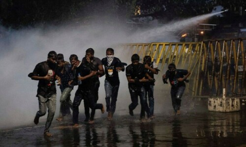 Sri Lanka police impose curfew, fire tear gas as unrest escalates Sri Lanka police impose curfew, fire tear gas as unrest escalates
