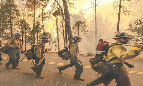 California wildfire grows as US bakes in record heat